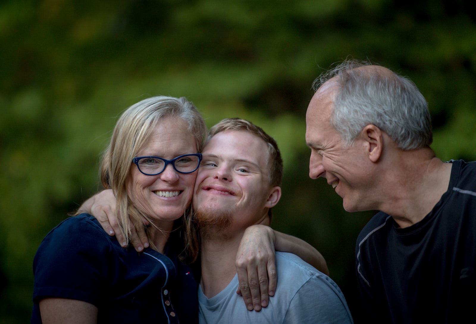 Photo of visually impaired man benefiting from accessibility standards.