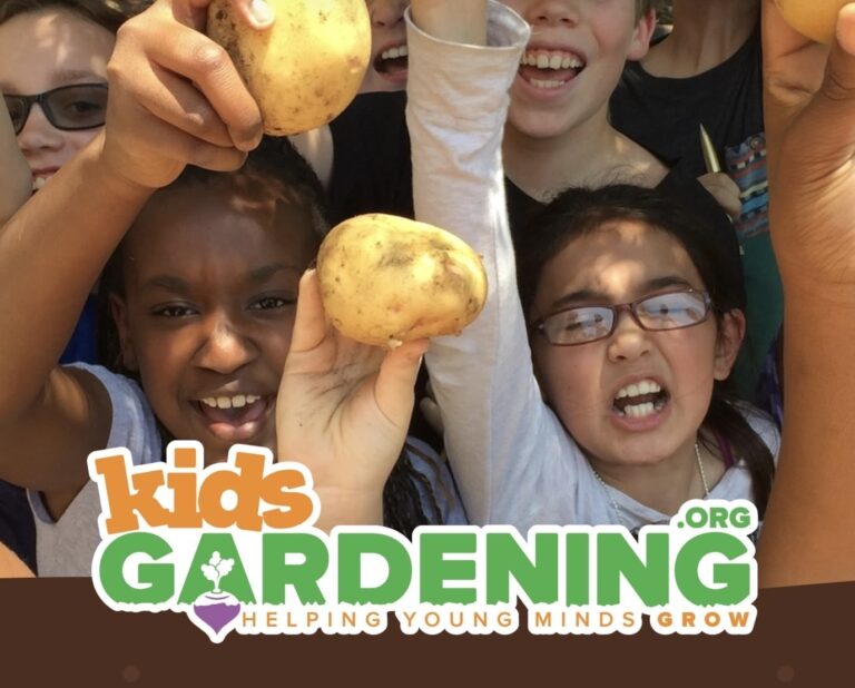 Kids holding up freshly dug potatoes above the KidsGardening logo